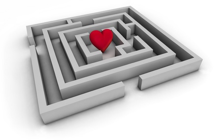 Love concept with labyrinth and a red heart on white background  Top view の写真素材
