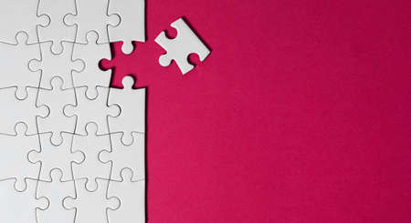 Last piece to complete the jigsaw puzzle business solution and problem solving concept top view with copy space.の写真素材