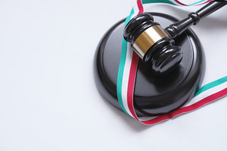 Italy law, legal system, legislation and justice concept with a top view of a judge gavel and a...