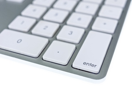 Modern aluminum computer keyboard isolated on white backgroundの写真素材