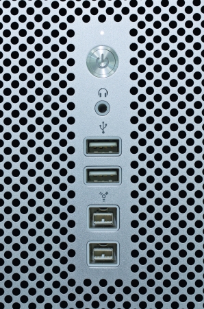 Power button and Usb port on Metal Hole Backgroundの写真素材