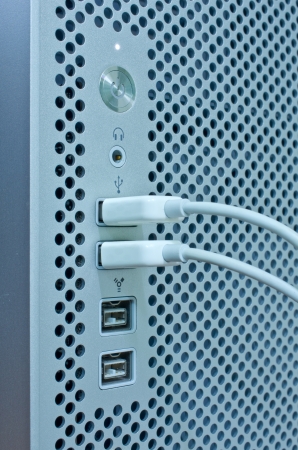 Power button and Usb port on Metal Hole Backgroundの写真素材