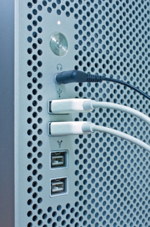 Power button and Usb port on Metal Hole Backgroundの写真素材