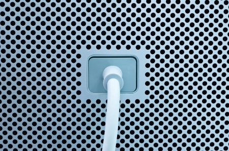 The electrodes are connected to the white power plug の写真素材