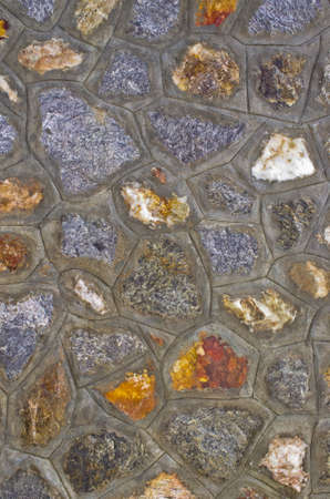 The decorative stone wall and beautiful beach theme background.の写真素材