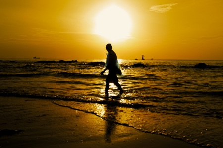 The fisherman were netted out to sea at sunrise.の写真素材