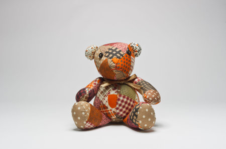Teddy bears made from fabric scraps. Isolated on white.の写真素材