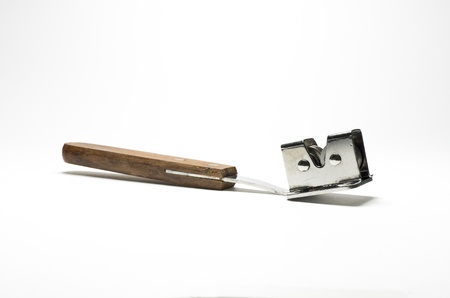 Sharpening the kitchen knives. Isolated on a white background.の写真素材