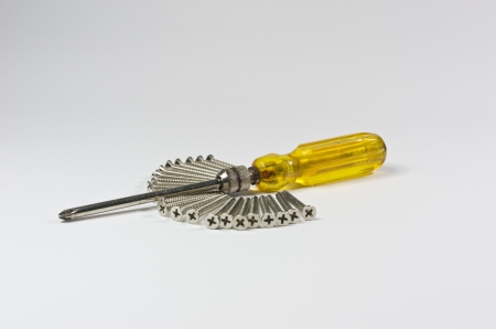 Screwdriver handle of yellow and Screw. Isolated on white.の写真素材