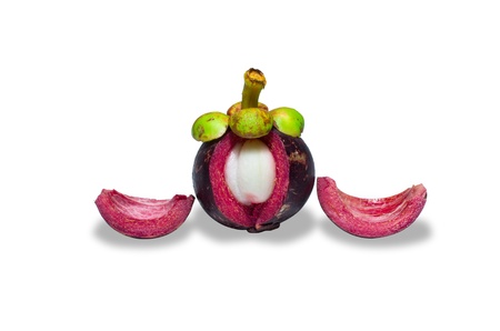 tropical mangosteen fruit on white background (selective focus on front piece)の写真素材