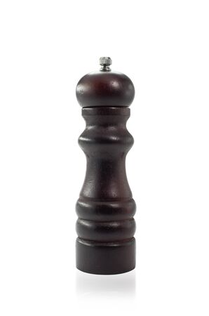 A Wooden pepper grinder isolated on white backgroundの写真素材