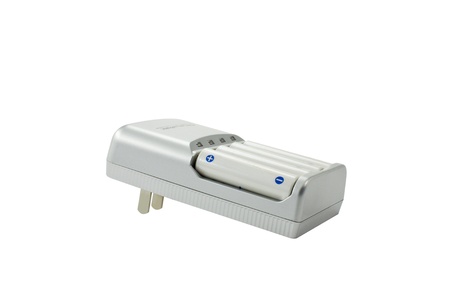 AA battery charger battery charger isolated on white background.の写真素材