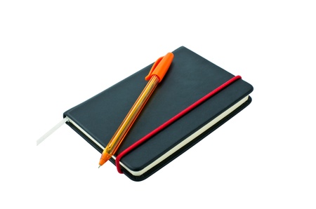 Small black notebook with blank cover. Isolated on white.の写真素材