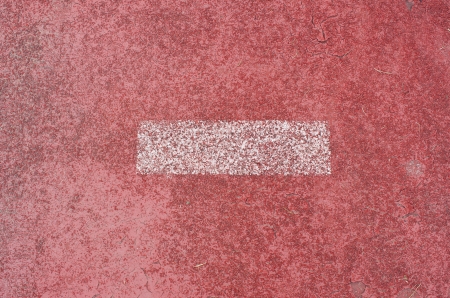 The first track, Running racetrack on empty ground red.の写真素材