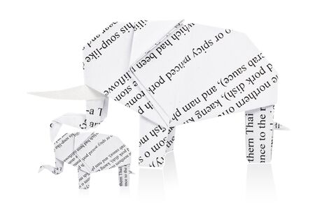 Origami elephant. Made from recycled paper. Isolated on white.の写真素材