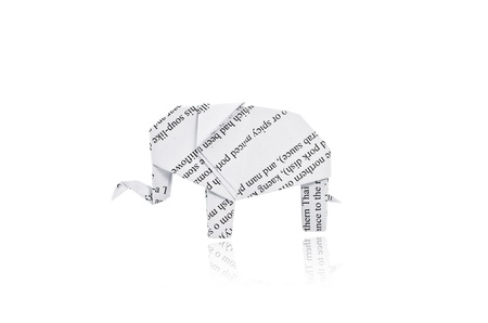 Origami elephant. Made from recycled paper. Isolated on white.の写真素材