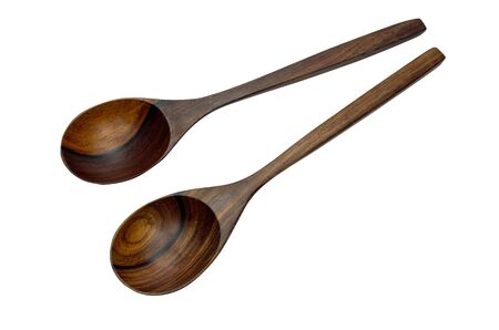 Wooden spoon as a tool for cooking isolate on white.の写真素材