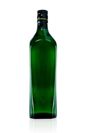 Green empty whiskey bottle vertical. Isolated on a white background.の写真素材