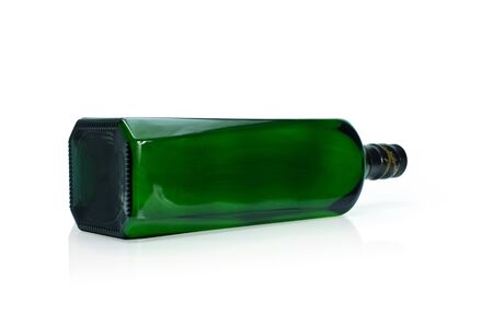 Green empty whiskey bottle vertical. Isolated on a white background.の写真素材