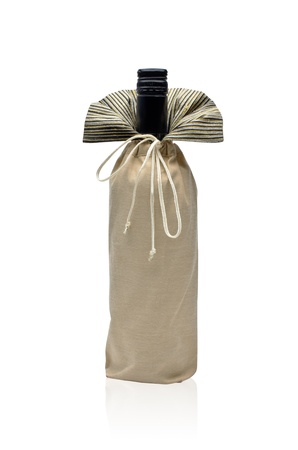 Wine bottle in packaging, isolated on a white background.の写真素材