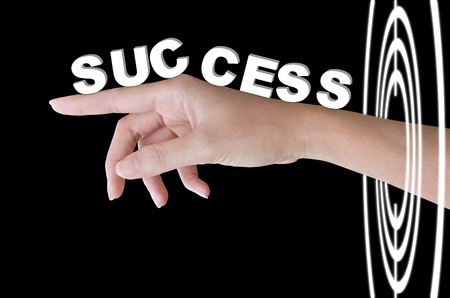 Hand women through the successful concept isolated on blackの写真素材