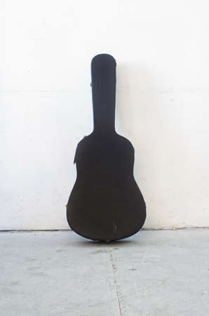 The Old Guitar case on white backgroundの写真素材