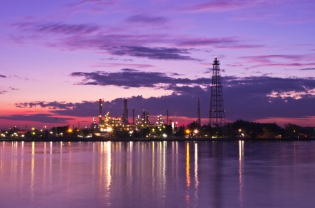 Oil refinery factory at Twilight. Chao Phraya river in Bangkok, Thailand.の写真素材