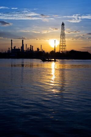 Oil refinery factory at Twilight. Chao Phraya river in Bangkok, Thailand.の写真素材