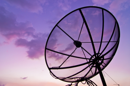 At twilight Satellite dish antenna communication Technology Networkの写真素材