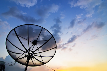 At twilight Satellite dish antenna communication Technology Networkの写真素材