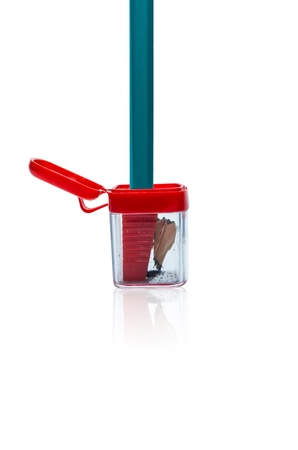 Pencil sharpener is a box with a red lid.の写真素材