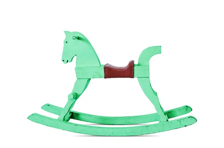 Child's wooden rocking horse, green isolated on white background.の写真素材