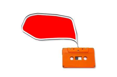 Orange Vintage audio cassette with speech bubbles  isolated on white background.の写真素材