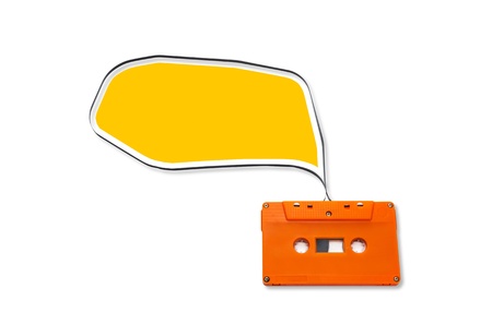 Orange Vintage audio cassette with speech bubbles  isolated on white background.の写真素材