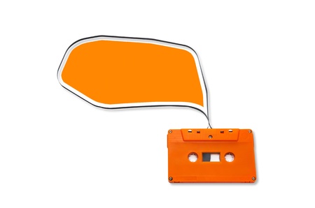 Orange Vintage audio cassette with speech bubbles  isolated on white background.の写真素材