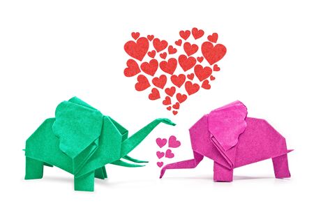 The origami elephant asian recycle Pink and Green paper with love, Isolated on white の写真素材