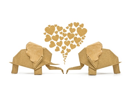 The origami elephant asian recycle paper with love, Isolated on white の写真素材