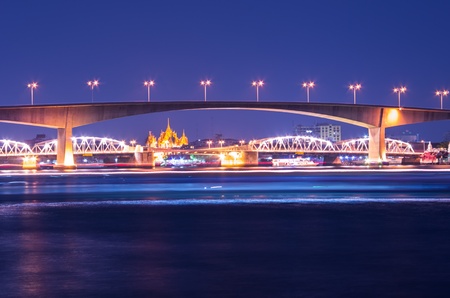 Rama III Bridge at night as a bridge between Bangkok and Thonburi.の写真素材