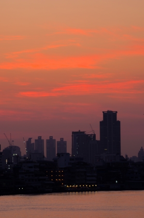 The modern buildings on the river during the morning.の写真素材
