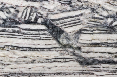 Stone background closeup texture. Focus on the pattern of the surface.の写真素材