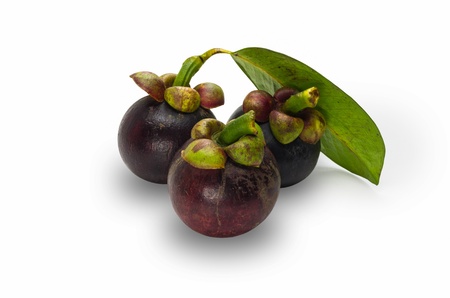 Mangosteen with leaves. The Queen of Fruits. Isolated on white.の写真素材