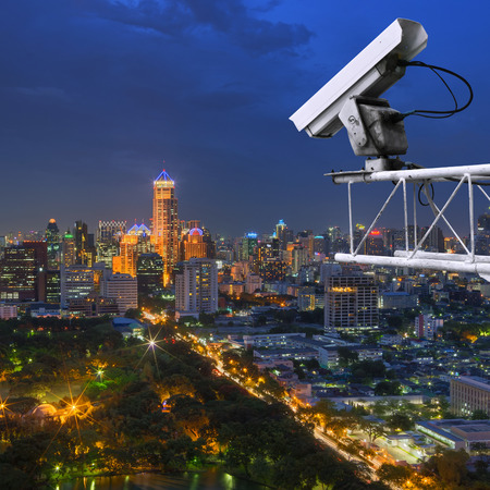 Security cameras monitor the movement of the top of the building, Aerial view of Bangkok.の写真素材
