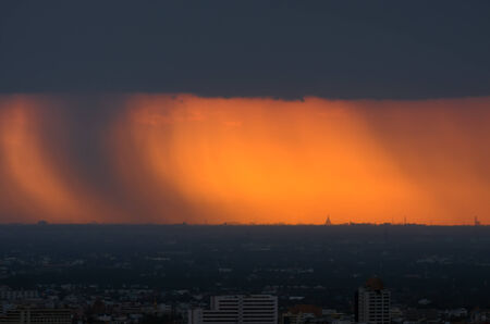 Bangkok view on a stormy raining focus pagoda under the storm.の写真素材