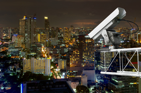 Outdoor security cameras on high towers. Set against the high corner of Bangkok.の写真素材