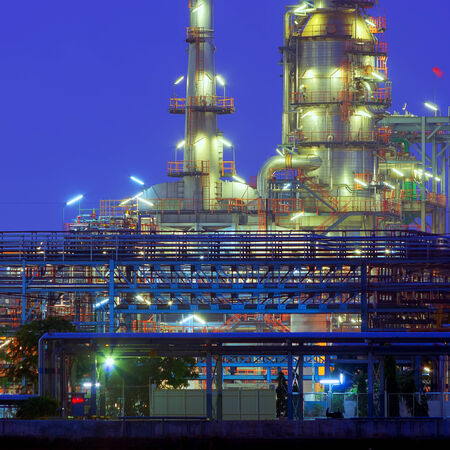 Oil refinery factory at twilight Chao Phraya river in Bangkok, Thailand.の写真素材