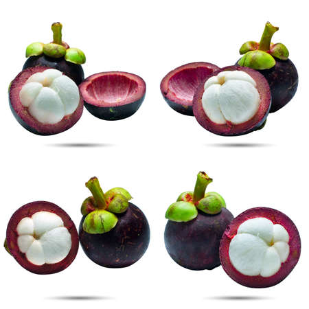 Mangosteen fruit isolated on white background (selective focus on front piece)の写真素材