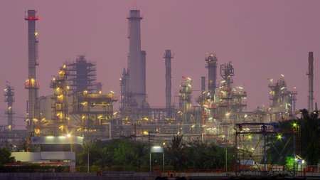 Oil refinery factory at twilight Chao Phraya river in Bangkok, Thailand.の写真素材