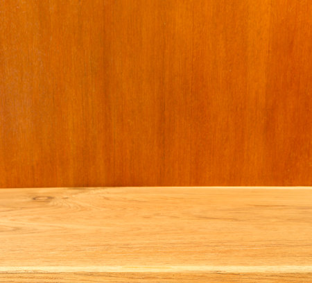Wooden table top with background blur - can be used for display or editing of your product.の写真素材