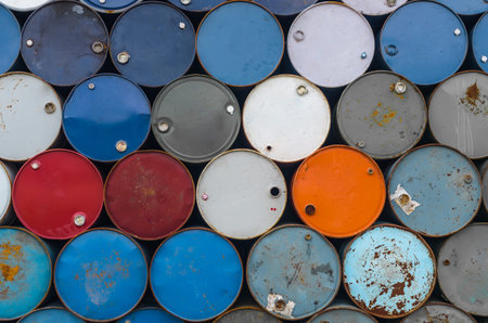 Stacks of old oil tanks for background and texture.