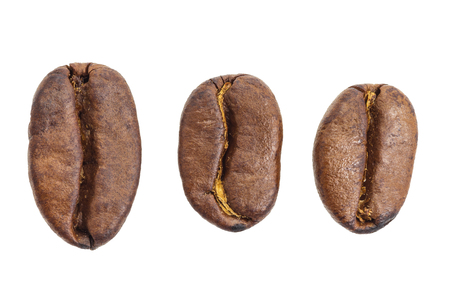 Roasted coffee beans isolated on white background with clipping path.の写真素材
